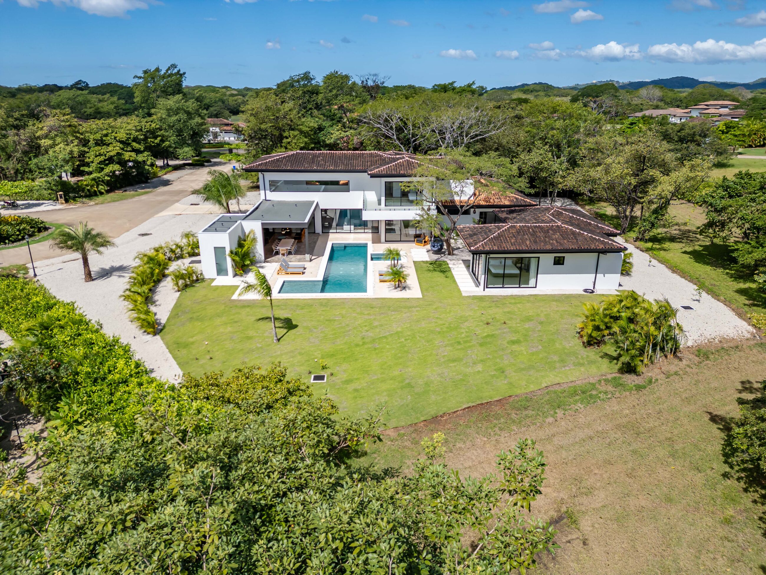 Tropical Chic 6-Bedroom Mansion Located in Exclusive Hacienda Pinilla Community