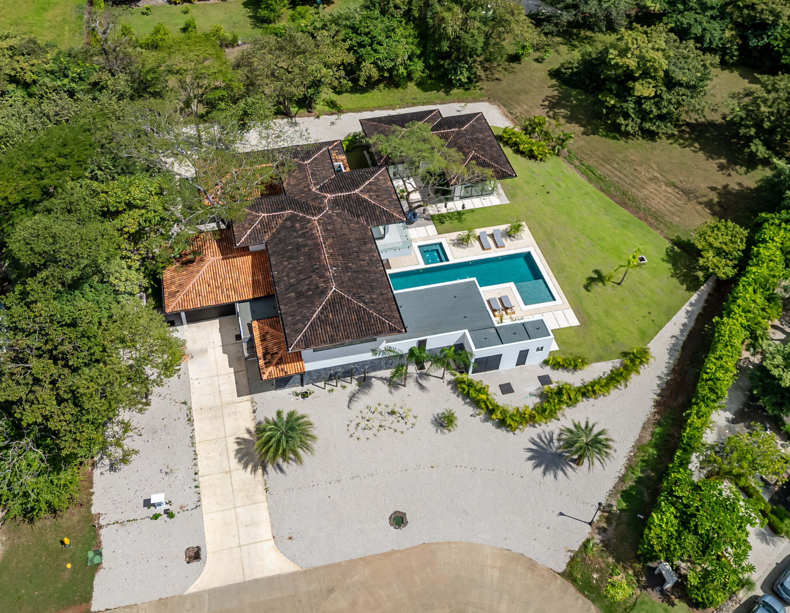 Tropical Chic 6-Bedroom Mansion Located in Exclusive Hacienda Pinilla Community
