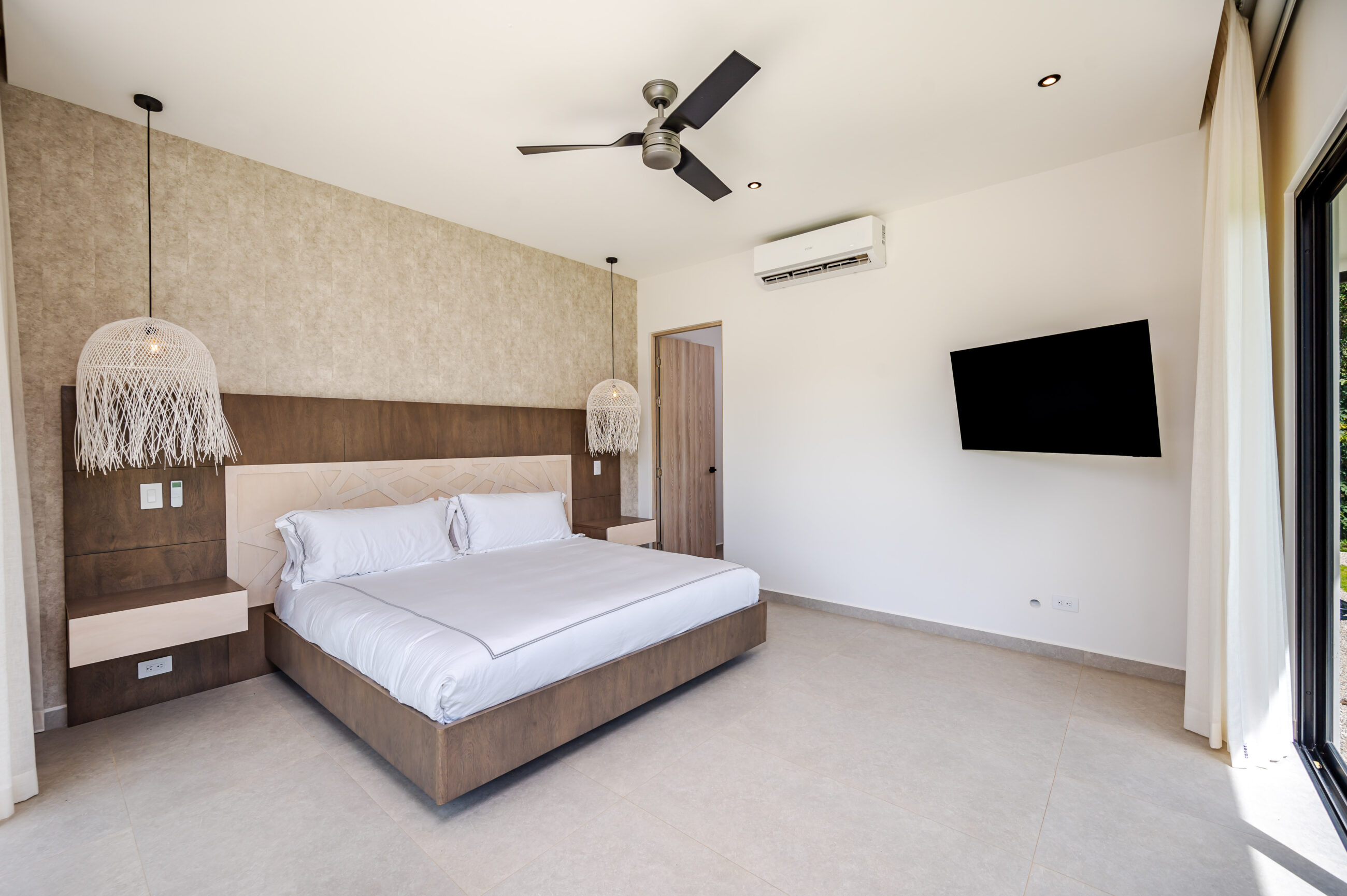 Tropical Chic 6-Bedroom Mansion Located in Exclusive Hacienda Pinilla Community