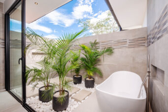 Tropical Chic 6-Bedroom Mansion Located in Exclusive Hacienda Pinilla Community