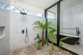 Tropical Chic 6-Bedroom Mansion Located in Exclusive Hacienda Pinilla Community